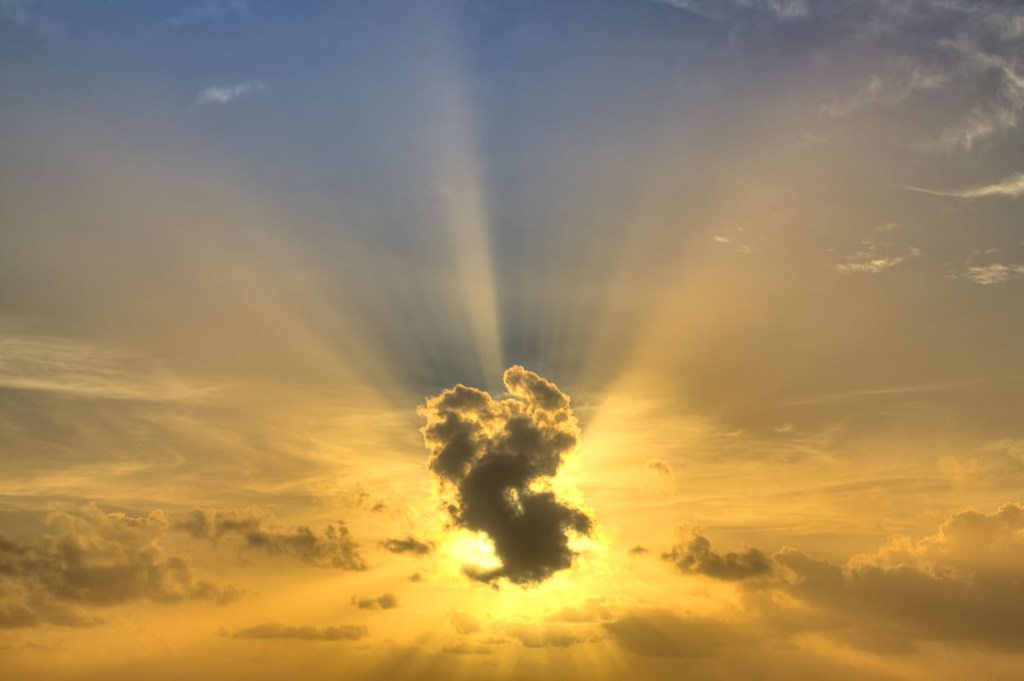 Light Bursting from Cloud Sunrays Beam of Light Clouds